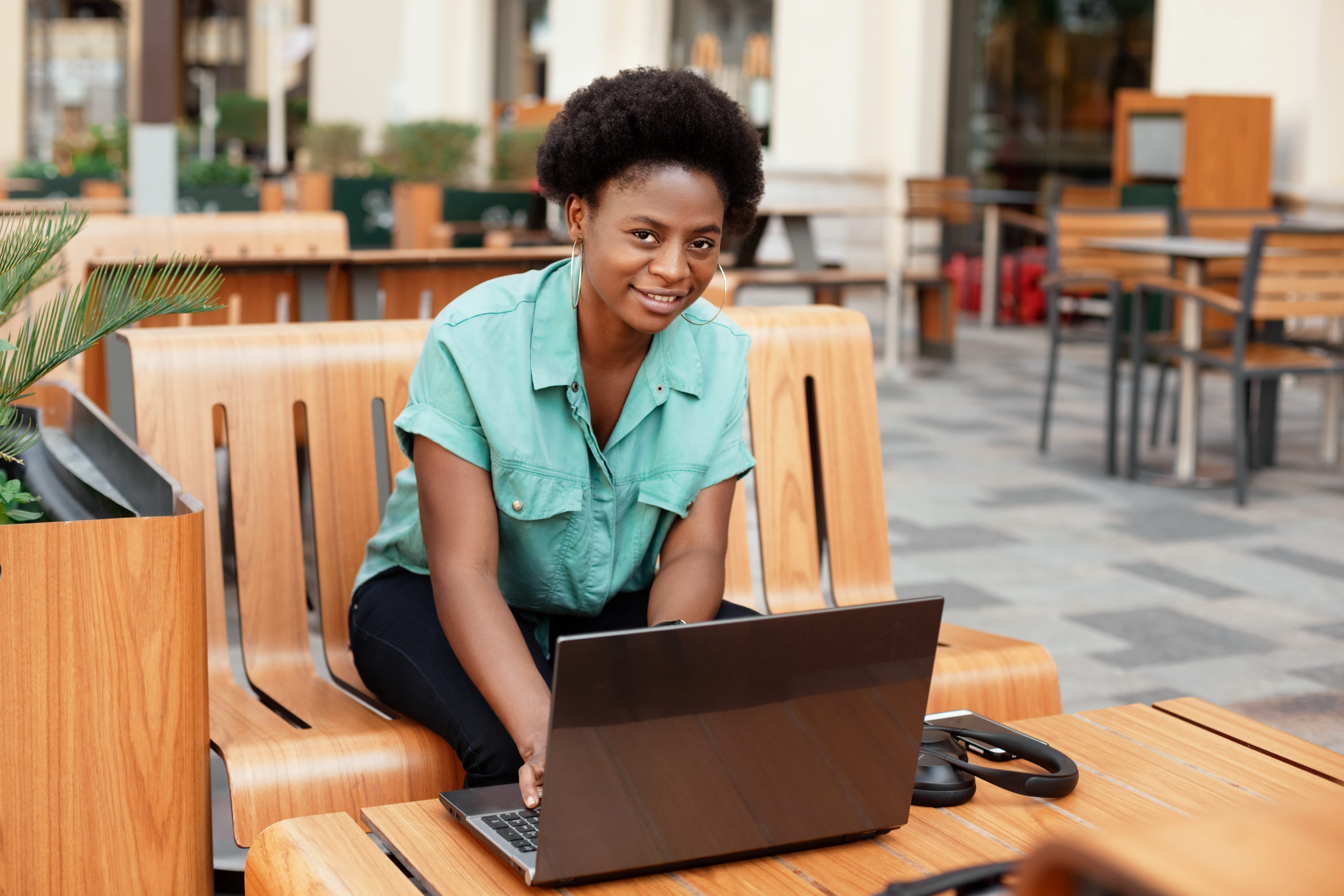 happy young woman working on laptop happy young woman working on laptop