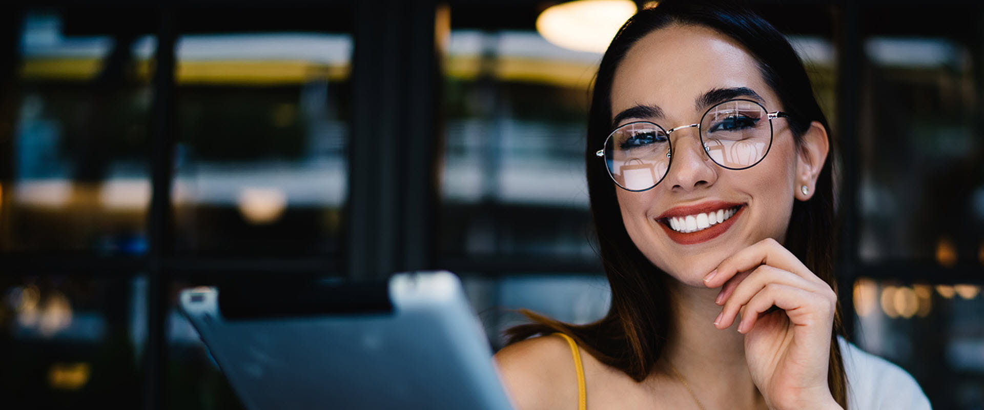 smiling woman using tablet smiling woman using tablet