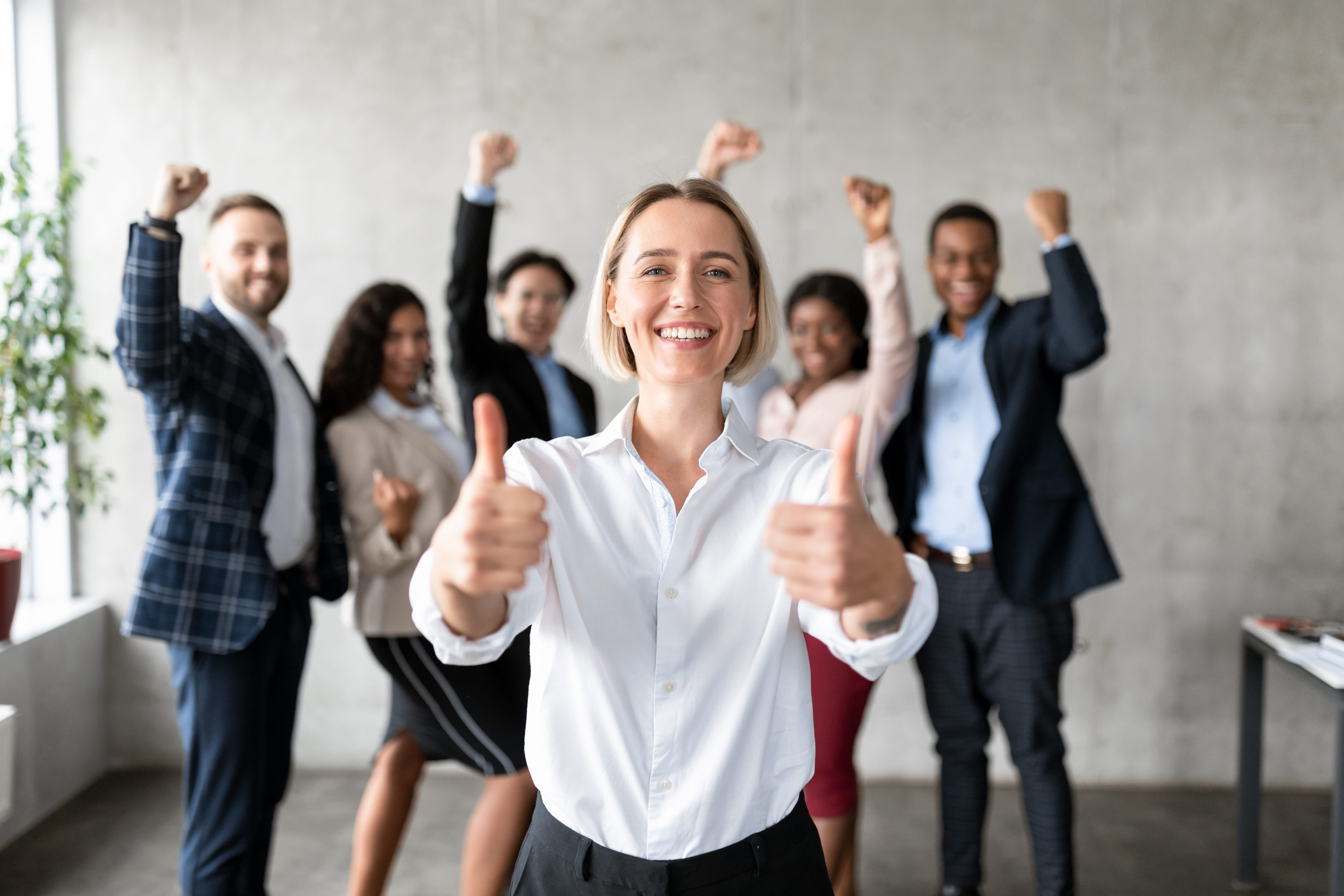 woman giving thumbs up woman giving thumbs up